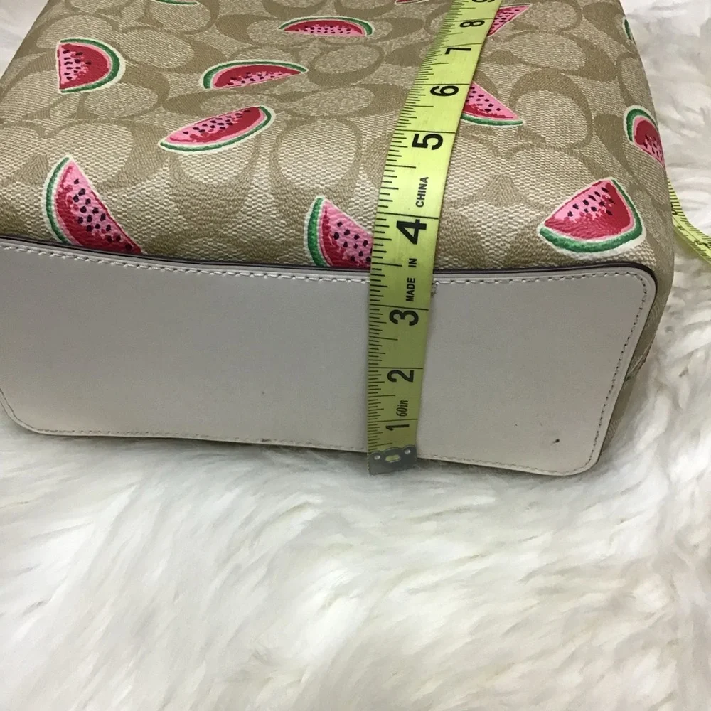 Coach Small Town Bucket Bag in Signature Canvas with a watermelon print. EUC - Picture 7 of 16